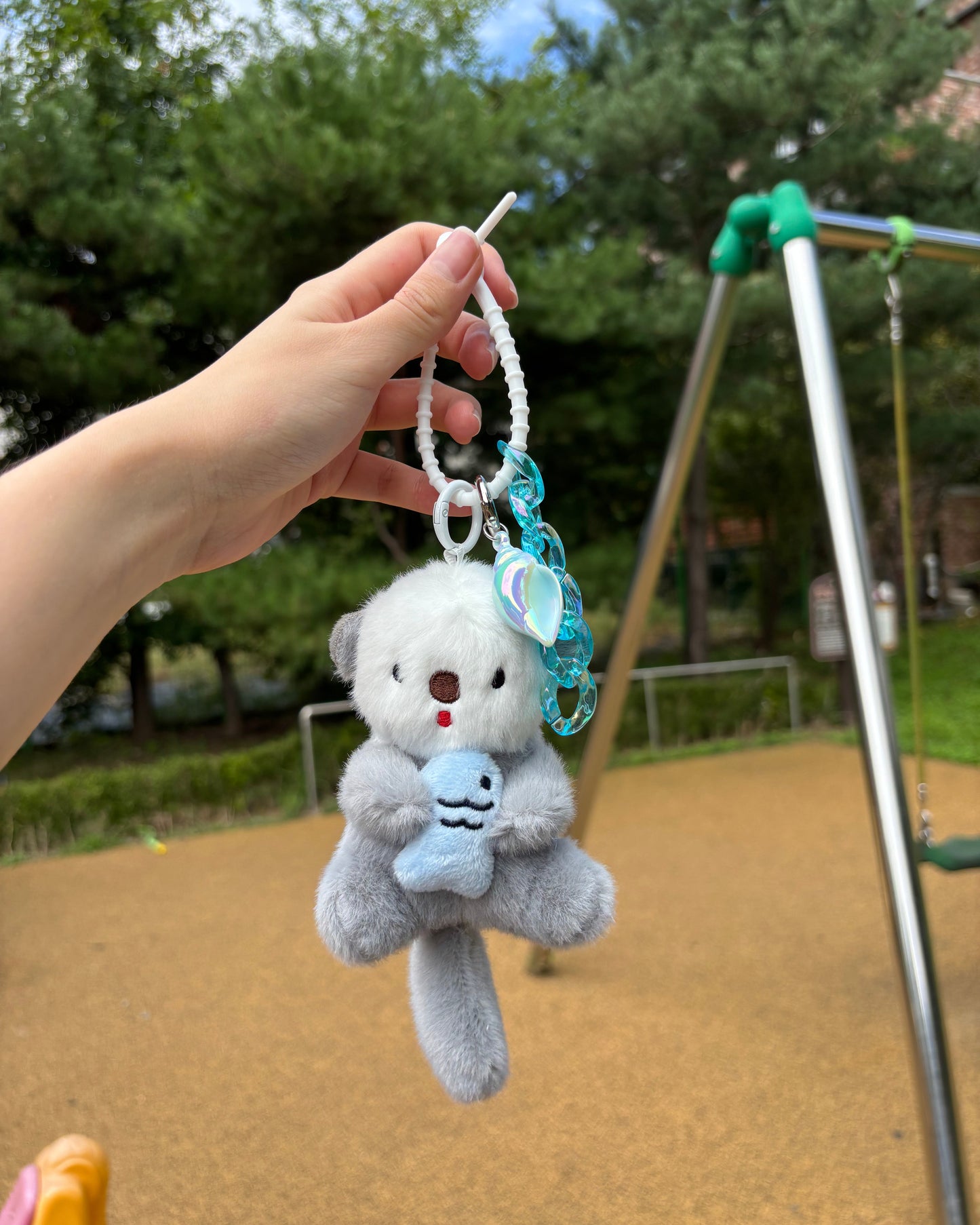 Fuzzy Otter Trio Keychains