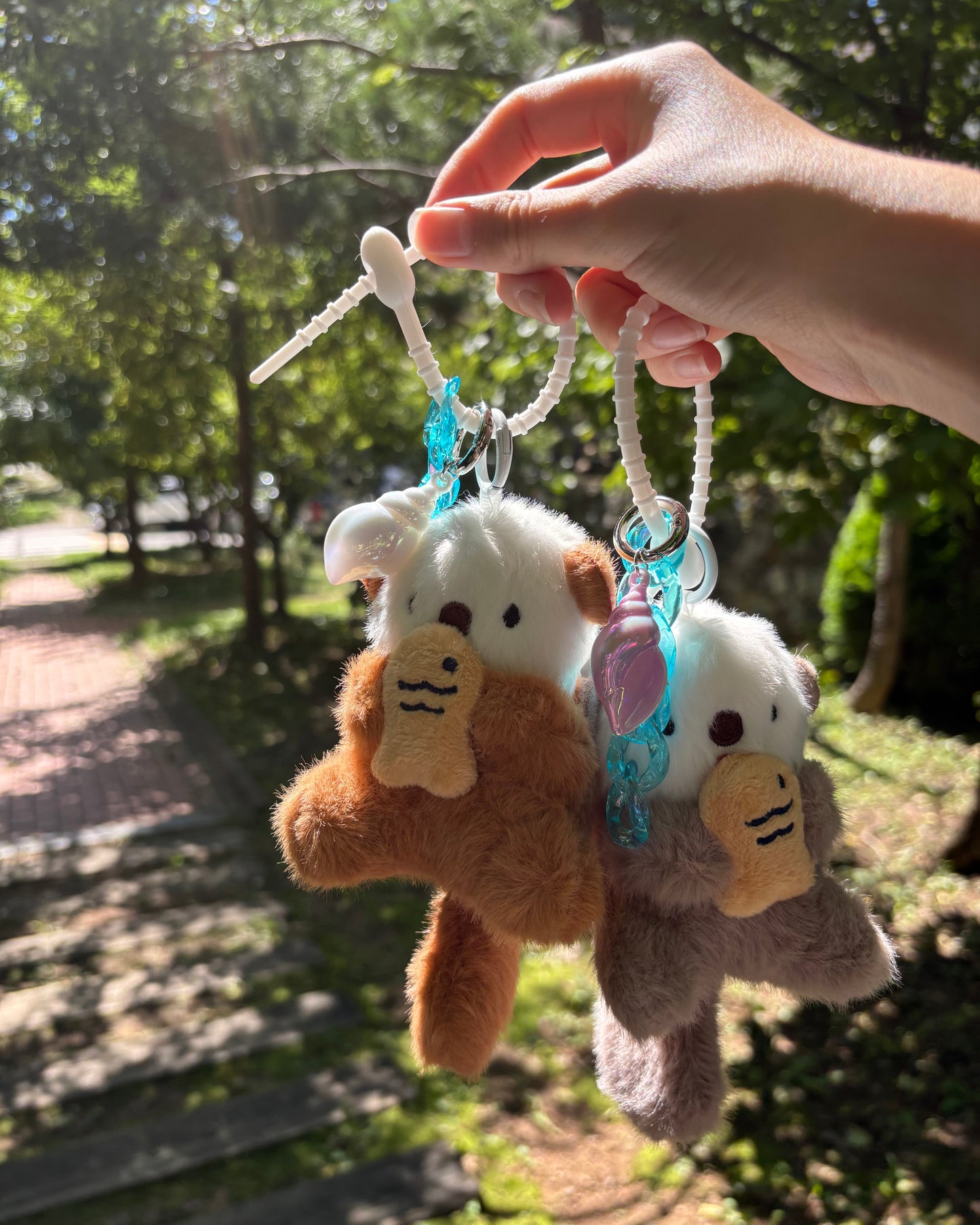 Fuzzy Otter Trio Keychains